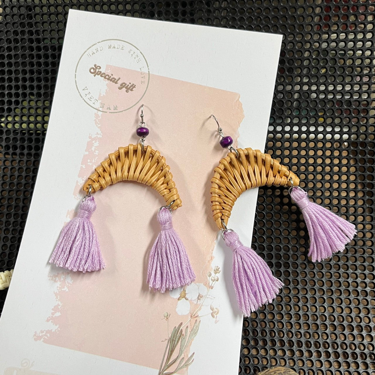 Moon-shaped bamboo and rattan earrings with tassels